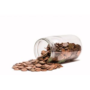 Coins spilling out of jar