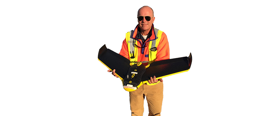 Bob Johnson holding a drone